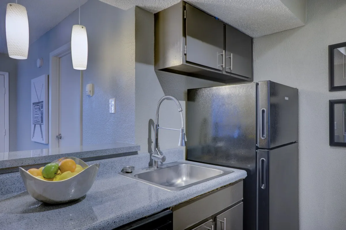 Bright modern kitchen with refrigerator